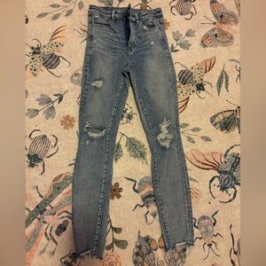 American Eagle high waisted skinny ripped jeans - size 4